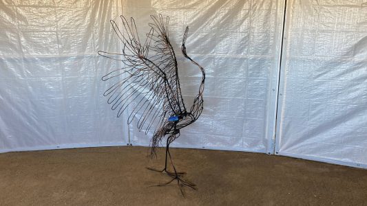 Crane - wings out - 5 feet 6 inches high, 4 feet 6 inches wide.