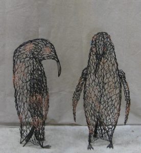 Penguins  -  38 inches high and each is 28 inches wide.
