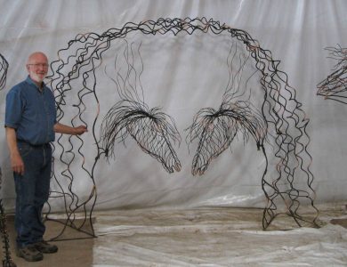 Arch with horse head gate -  6 feet 11 inches high and 9 feet wide.
